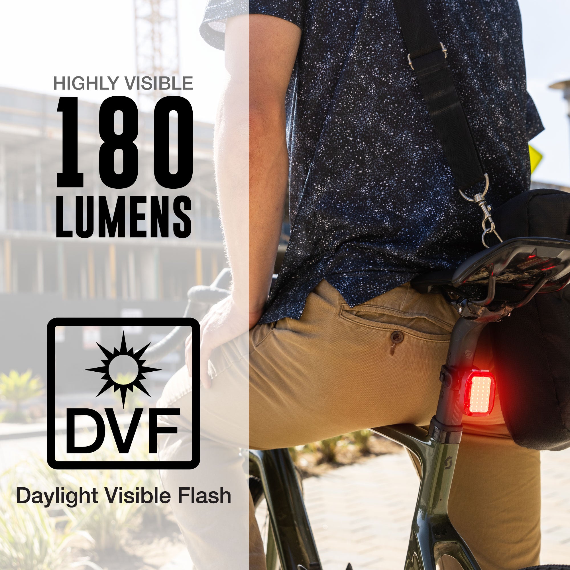 commuter cyclist riding in the city with a bright bike rear taillight