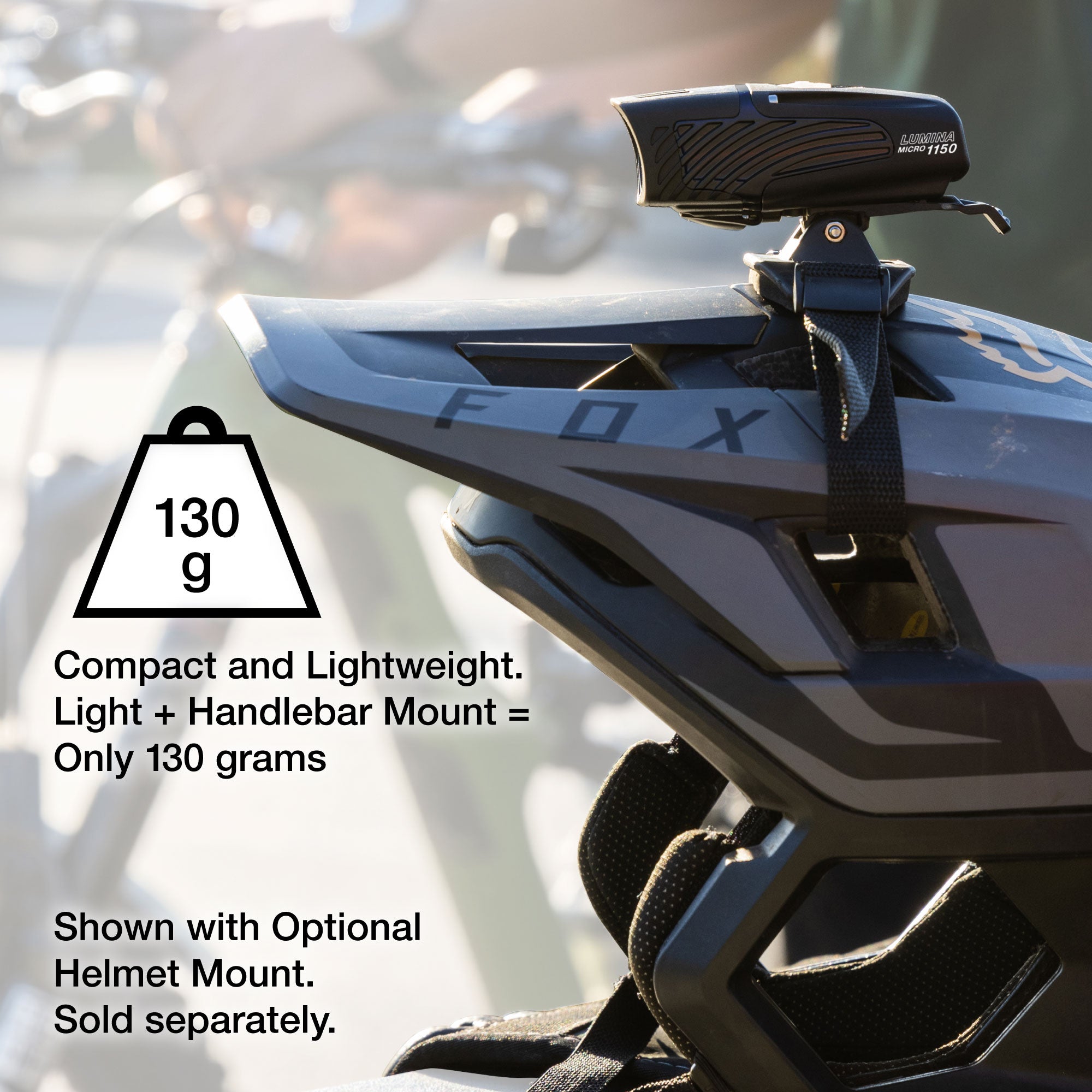 Motorcycle light with handlebar mount on a blurred background