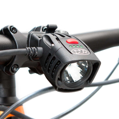 Pro 1400 Race Front Bike Light mounted on mtb handlebars