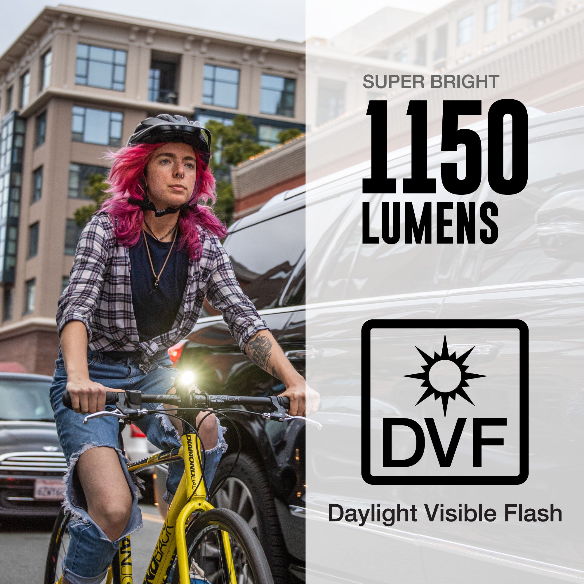 Person riding a bicycle with a bright light on a city street, featuring DVF branding.